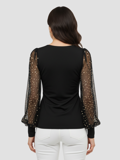 AURELLINE | BLUSA DE MALLA CON DESTELLOS Y ESCOTE EN V – ELEGANCIA NOCTURNA Y BRILLO SUTIL