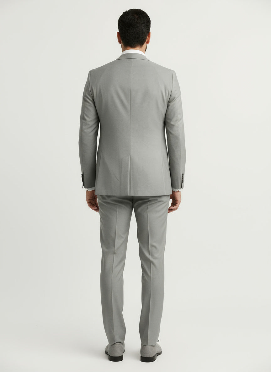 EZQUERRA | TRAJE DE TRES PIEZAS | SOFISTICACIÓN ATEMPORAL