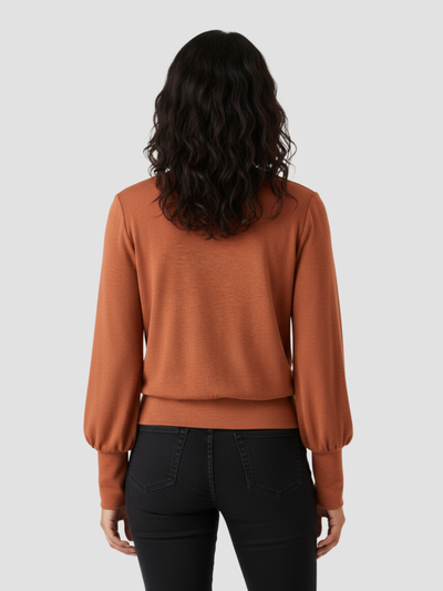 DACIO | TOP DE PUNTO ELÁSTICO CON SOPORTE – LÍNEAS LIMPIAS Y FACILIDAD COTIDIANA